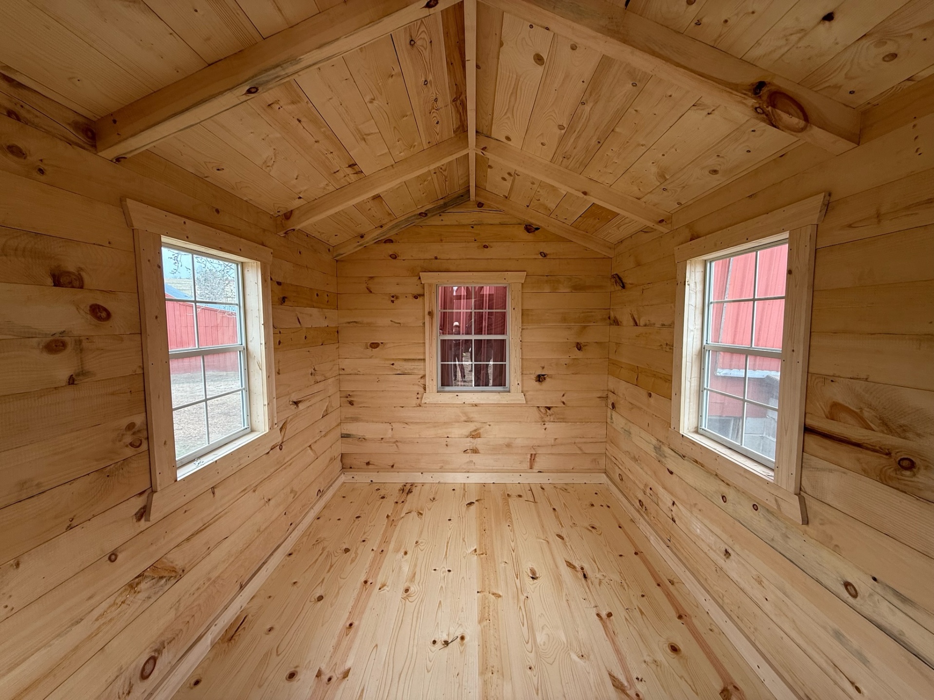 Bright pine interior with vaulted ceiling