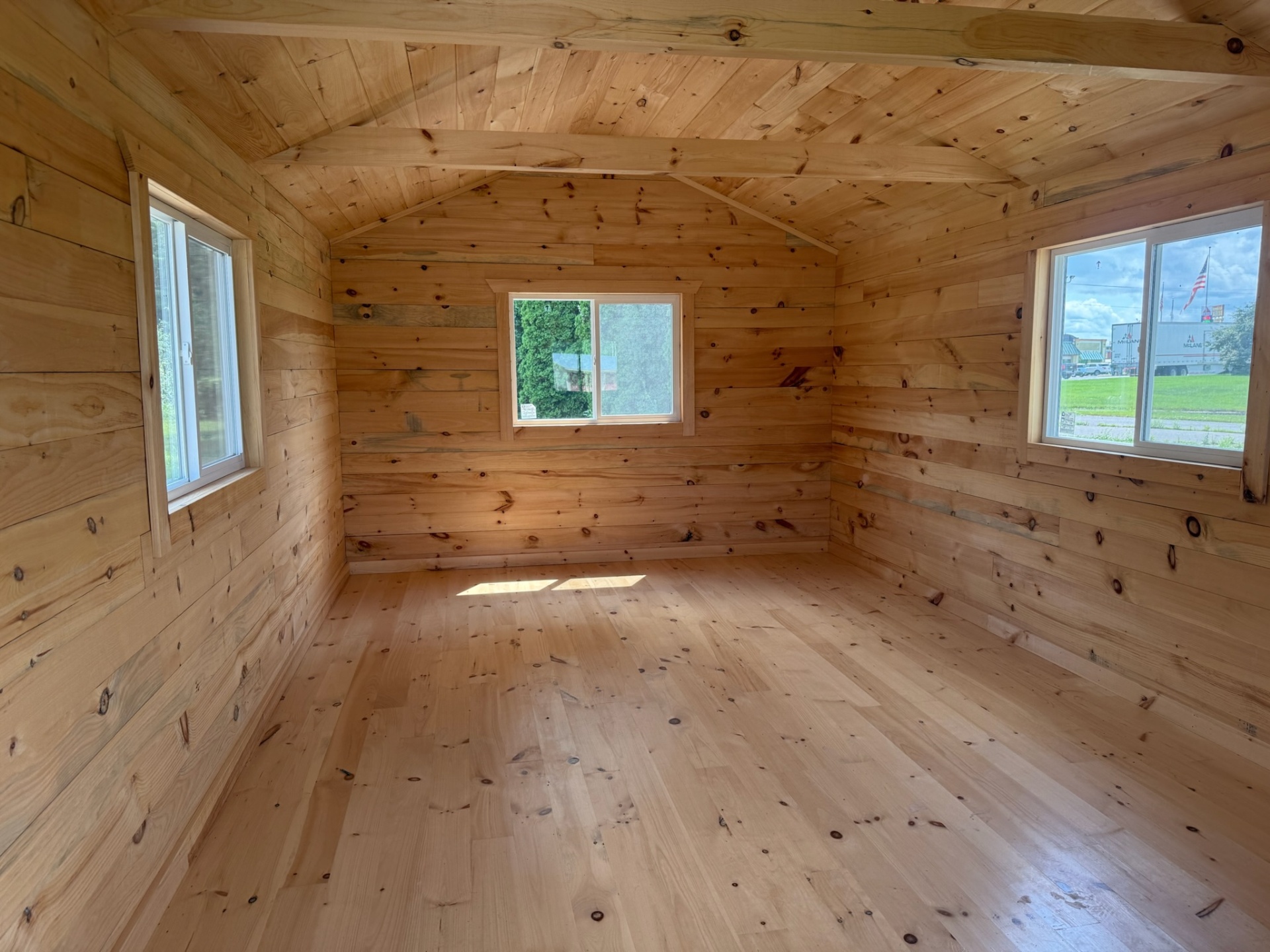 Spacious pine interior with wide plank floors